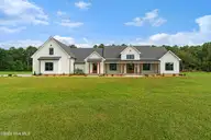 107 Mayflower Drive, Newport, NC 28570 — 3-bedroom home in Chadwick Shores Plantation, Newport, NC, photo 1 of 60: Stunning home in Chadwick Shores