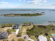 Lot 21r Shipyard Lane, Hampstead, NC 28443 — waterfront lot in Sloop Point Plantation, Hampstead, NC, photo 24 of 36: 17-web-or-mls-DJI_20250409112408_0119_D