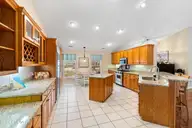 618 Oyster Bay Drive, Sunset Beach, NC 28468 — 3-bedroom home in Sea Trail Plantation, Sunset Beach, NC, photo 10 of 62: Chef's kitchen