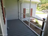 4111 Yarmouth Road, New Bern, NC 28562 — 3-bedroom home in Kings Row, New Bern, NC, photo 2 of 25: Screened FRONT porch
