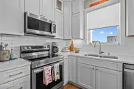 4929 E Pelican Drive, Oak Island, NC 28465 — 4-bedroom waterfront home in Tranquil Harbor, Oak Island, NC, photo 9 of 41