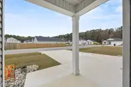 5231 Soy Bean Drive NE, Winnabow, NC 28479 — 5-bedroom home in Country Walk, Winnabow, NC, photo 8 of 57: 8_front yard