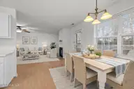 2000 Clark Court, Morehead City, NC 28557 — 3-bedroom home in Joslyn Trace, Morehead City, NC, photo 15 of 43: Coastal-inspired dining and living room