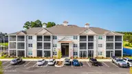 395 S Crow Creek Dr 1702, Calabash, NC 28467 — 3-bedroom condo in Crow Creek, Calabash, NC, photo 1 of 39: Front of Condo