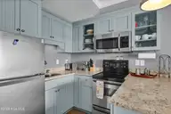 106 N Water Street 907, Wilmington, NC 28401 — 1-bedroom condo in Water Street Center Condo, Wilmington, NC, photo 12 of 34: Kitchen
