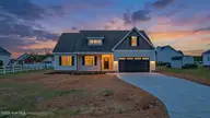 302 Ellington Way, La Grange, NC 28551 — 3-bedroom home in Ellington, La Grange, NC, photo 2 of 23: Front Exterior Twilight