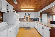 4025 E Beach Drive, Oak Island, NC 28465 — 3-bedroom waterfront home in Long Beach, Oak Island, NC, photo 17 of 40: 33-web-or-mls-CAMMediaLLC.com (33 of 47)