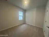 563 Coronado Avenue SE, Leland, NC 28451 — 3-bedroom home in Herring Shores, Leland, NC, photo 16 of 17: Bedroom 3