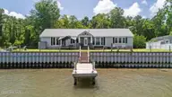 1074 Sea Gate Drive, Newport, NC 28570 — 3-bedroom waterfront home in Sea Gate, Newport, NC, photo 3 of 59: Rear from the water