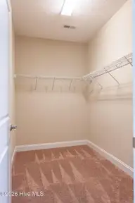 103 Laurel Oak Lane, Pinebluff, NC 28373 — 4-bedroom home in The Pines, Pinebluff, NC, photo 14 of 34: Walk-in-closet