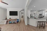 101 SW 28th Street, Oak Island, NC 28465 — 5-bedroom home in Pinners Point, Oak Island, NC, photo 20 of 56: Kitchen/Living Room