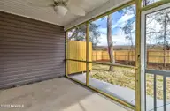 2044 N Tanglewood Drive SW, Supply, NC 28462 — 3-bedroom home in Fairwood, Supply, NC, photo 15 of 33: 3_2 Tandem Porch c