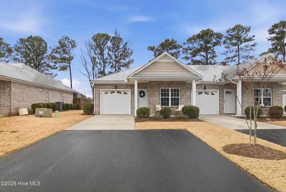 120 Grace Point Drive, Leland, NC 28479 — 2-bedroom townhome in Mallory Creek Plantation, Leland, NC, photo 1 of 53: 3_front center