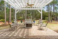2585 Parkridge Drive, Southport, NC 28461 — 4-bedroom waterfront home in St James, Southport, NC, photo 8 of 77: Modern Pergola Design