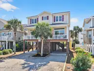 43 Private Drive, Ocean Isle Beach, NC 28469 — 5-bedroom waterfront home in Summer Place, Ocean Isle Beach, NC, photo 1 of 49: Front View