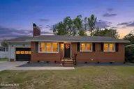 703 Christine Avenue, Jacksonville, NC 28540 — 3-bedroom home in Northwoods Park, Jacksonville, NC, photo 1 of 46: 703 Christine Twilight