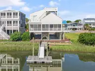 423 Cobia Street, Sunset Beach, NC 28468 — 4-bedroom waterfront home, Sunset Beach, NC, photo 1 of 53