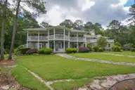 1064 Tresses Court, Vass, NC 28394 — 4-bedroom waterfront home in Woodlake, Vass, NC, photo 9 of 50: Back View