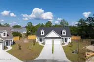 305 Coastal Reef Court, Holly Ridge, NC 28445 — 3-bedroom townhome in Coastal Village, Holly Ridge, NC, photo 3 of 27: Coastal Village - Exterior_Aerials _6