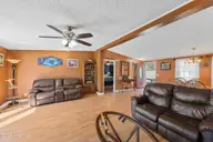 195 Calabash Road NW, Calabash, NC 28467 — 3-bedroom manufactured home in Carolina Shores, Calabash, NC, photo 13 of 37: Living Room