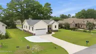 907 Sea Holly Court, New Bern, NC 28560 — 4-bedroom waterfront home in Fairfield Harbour, New Bern, NC, photo 3 of 55: 6-web-or-mls-DJI_20260708145245_0133_D