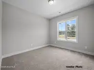 221 Holly Sands Loop, Holly Ridge, NC 28445 — 3-bedroom townhome in Holly Sands, Holly Ridge, NC, photo 22 of 36: Guest Bed #2