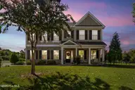 6112 Seagrove Court, Wilmington, NC 28412 — 4-bedroom home in Willow Glen, Wilmington, NC, photo 2 of 32: Twilight exterior
