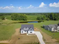 5515 River Buck Road, Spring Hope, NC 27882 — 3-bedroom home in River Dew, Spring Hope, NC, photo 3 of 38: DJI_20260903162704_0033_D
