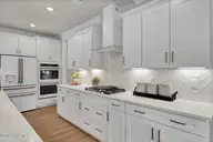 1313 Pandion Drive, Wilmington, NC 28411 — 4-bedroom home in Scotts Hill Village, Wilmington, NC, photo 11 of 21: Kitchen- NOT SUBJECT HOME SIMILAR PHOTO