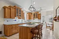 312 Lord Berkeley Drive, Emerald Isle, NC 28594 — 3-bedroom waterfront home in Royall Oaks, Emerald Isle, NC, photo 19 of 61: Bright Kitchen