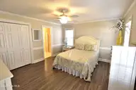 209 Old Colony Way, Rocky Mount, NC 27804 — 3-bedroom home in Colonial Trace, Rocky Mount, NC, photo 17 of 34: Primary Bedroom