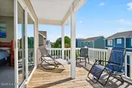 43 Private Drive, Ocean Isle Beach, NC 28469 — 5-bedroom waterfront home in Summer Place, Ocean Isle Beach, NC, photo 16 of 49: Master Bedroom Deck