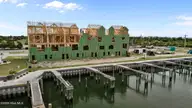200 Olde Towne Yacht Club Drive 49, Beaufort, NC 28516 — 3-bedroom waterfront townhome in Inlet Cove Townhomes, Beaufort, NC, photo 4 of 54: 5-web-or-mls-DJI_20250729165415_0997_D