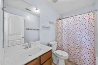 1163 Mill Creek Loop, Leland, NC 28451 — 3-bedroom waterfront home in Mill Creek Landing, Leland, NC, photo 21 of 32: Guest Bathroom