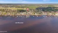 1000 Pine Street, Lake Waccamaw, NC 28450 — 4-bedroom waterfront home, Lake Waccamaw, NC, photo 10 of 60: 87-DJI_20260307143857_0006_D-Edit