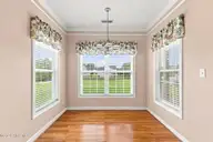 112 White Heron Lane, Swansboro, NC 28584 — 3-bedroom waterfront home in Bluewater Cove, Swansboro, NC, photo 15 of 60: breakfast nook 1