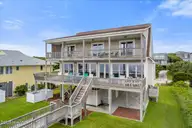 6715 Ocean Drive, Emerald Isle, NC 28594 — 6-bedroom waterfront home in Shell Cove, Emerald Isle, NC, photo 2 of 66: Back Exterior