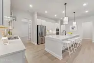 2079 Rosin Drive 17, Southport, NC 28461 — 3-bedroom home in Waters at Southport, Southport, NC, photo 5 of 39: Kitchen Island