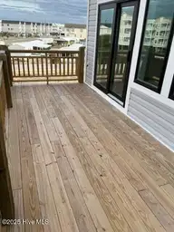 126 Shell Road, Surf City, NC 28445 — 3-bedroom waterfront townhome in Dune Ridge, Surf City, NC, photo 14 of 43: 126 Shell Road Deck photo