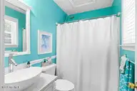 124 NE 15th Street, Oak Island, NC 28465 — 3-bedroom home in Long Beach, Oak Island, NC, photo 20 of 51: thumbnail-0196a7bd-010b-73b6-9a74-b738d9