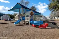 274 Twining Rose Lane, Holly Ridge, NC 28445 — 4-bedroom waterfront home in Summerhouse On Everett Bay, Holly Ridge, NC, photo 10 of 10: Community Playground
