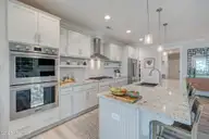 5119 Creswell Drive, Leland, NC 28451 — 3-bedroom waterfront home in Brunswick Forest, Leland, NC, photo 14 of 74: Kitchen