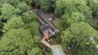 721 Blue Sail Drive SE, Bolivia, NC 28422 — 2-bedroom manufactured home in River Run Plantation, Bolivia, NC, photo 7 of 59: 51_drone
