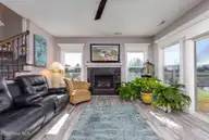 456 Pointe Vista Drive, Elizabeth City, NC 27909 — 4-bedroom waterfront home in The Waters At Sunset Pointe, Elizabeth City, NC, photo 12 of 49: 07-456 Pointe Vista - Living Room-3