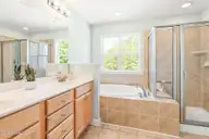 128 Wembley Drive, Clayton, NC 27527 — 3-bedroom townhome in Flowers Plantation, Clayton, NC, photo 14 of 22: primary bath