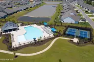 237 Eagle Claw Drive 3028, Carolina Shores, NC 28467 — 3-bedroom home in Eagle Run, Carolina Shores, NC, photo 15 of 17: Droe-pool-pickle ball