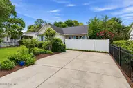 121 NE 6th Street, Oak Island, NC 28465 — 3-bedroom home in Tranquil Harbor, Oak Island, NC, photo 1 of 21: Driveway
