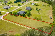 104 41 Anchorage Drive, Havelock, NC 28532 — lot in Moorings, Havelock, NC, photo 12 of 15: Aerial - Side View