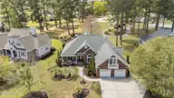555 Stanton Hall Drive NW, Calabash, NC 28467 — 3-bedroom home in Brunswick Plantation, Calabash, NC, photo 4 of 59: 4-web-or-mls-DJI_20260330132028_0026_D