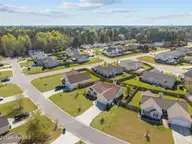 1966 Jeffrey Stokes Drive NE, Leland, NC 28451 — 3-bedroom home in Eastbrook, Leland, NC, photo 11 of 48: 11-web-or-mls-DJI_20260327152726_0278_D